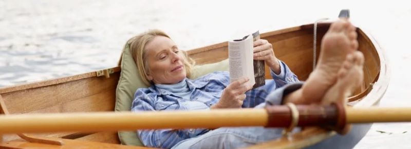 woman-reading-in-boat banner.jpg